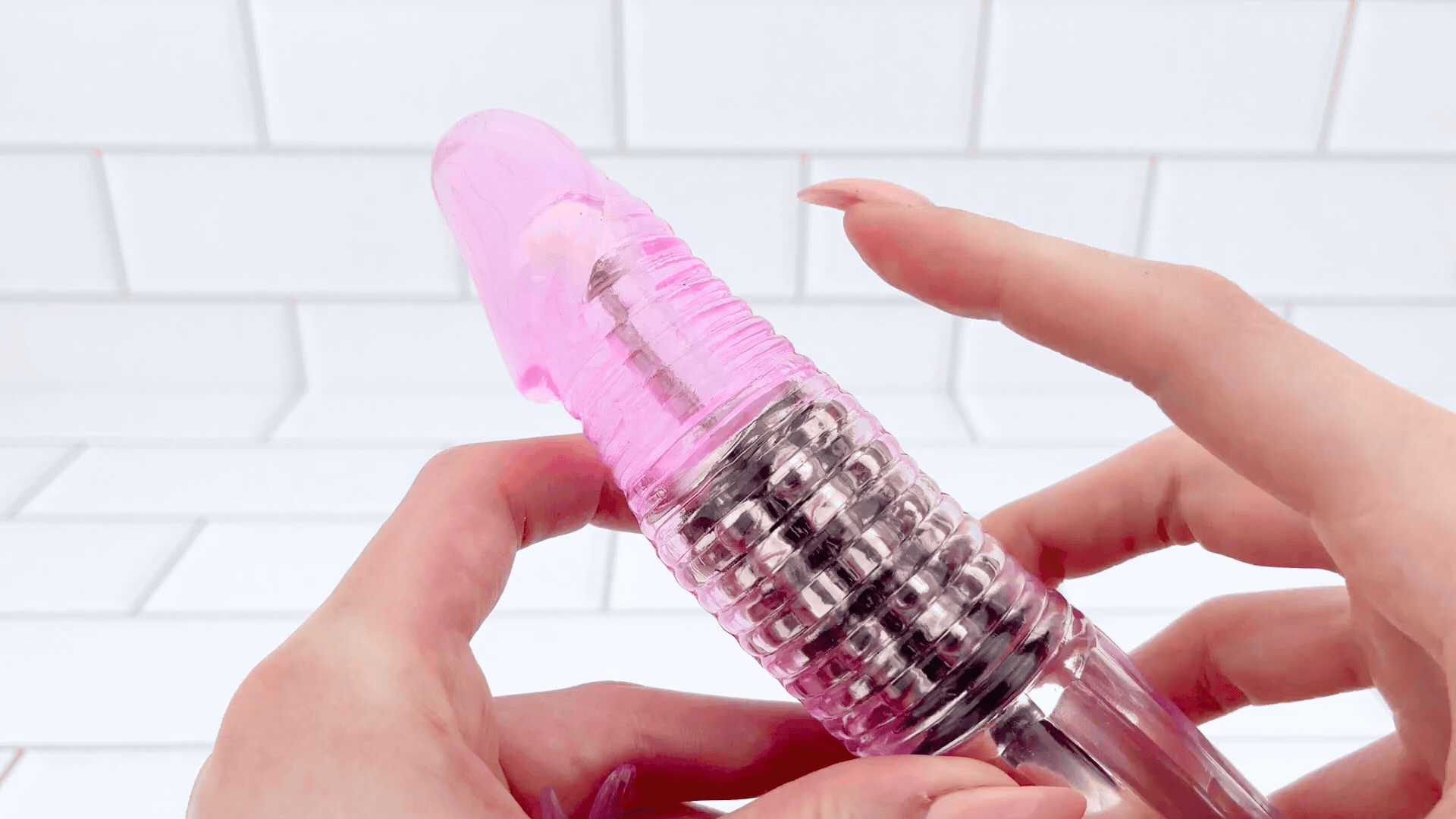 GIF of Rotating Rabbit Dual-Action Vibrator raised ribbed texture | AnneToys